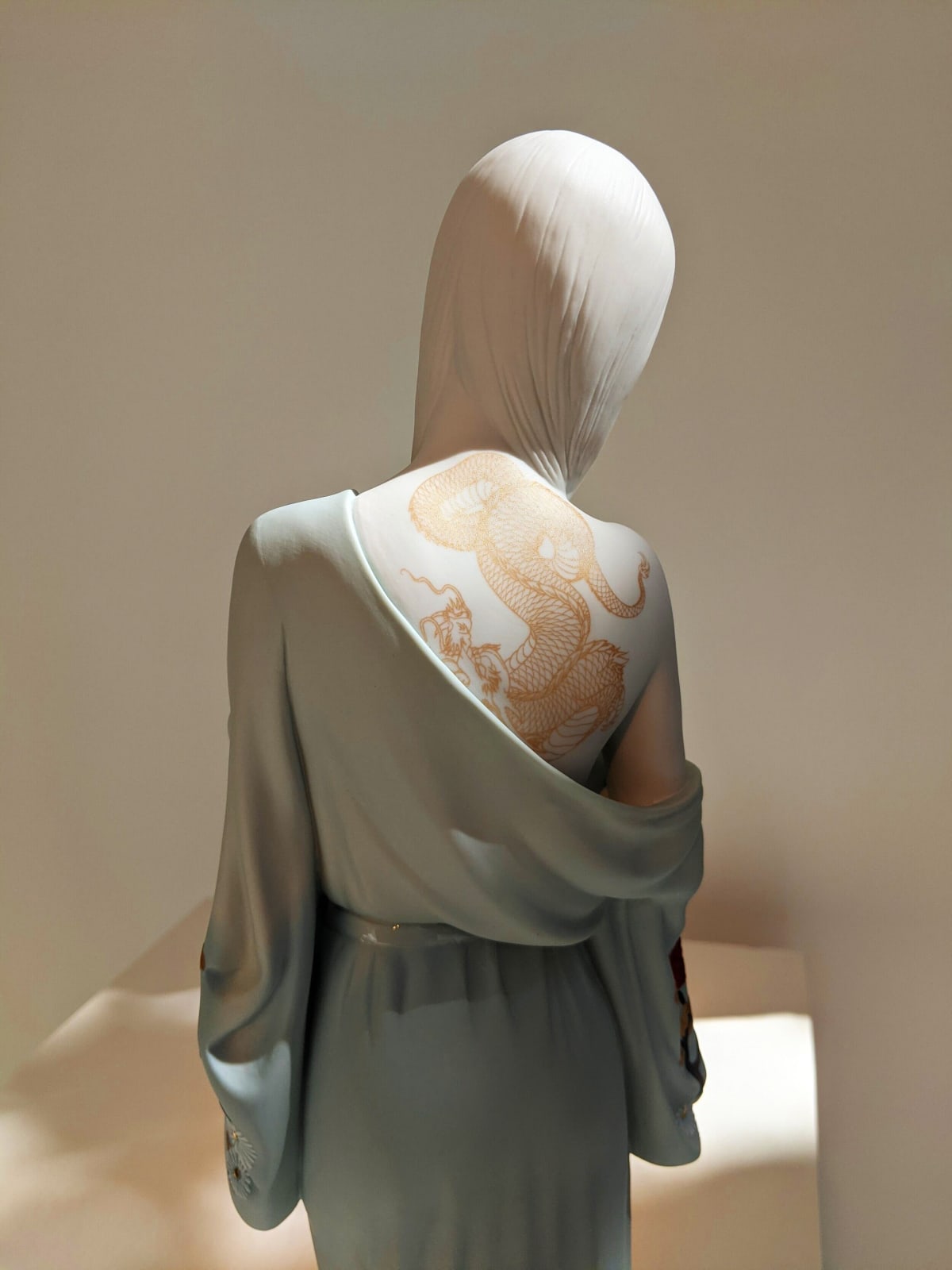 LLADRÓ, BEAUTY WITH DRAGON TATTOO WOMAN FIGURINE