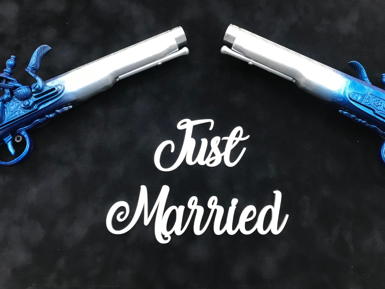 Blue & silver duelling pistols
