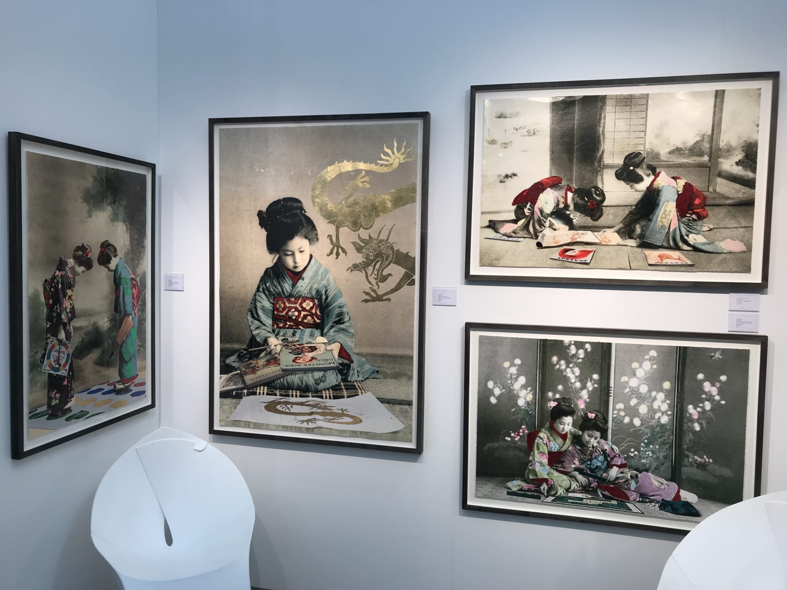 Framed Geisha Girl prints hung on wall
