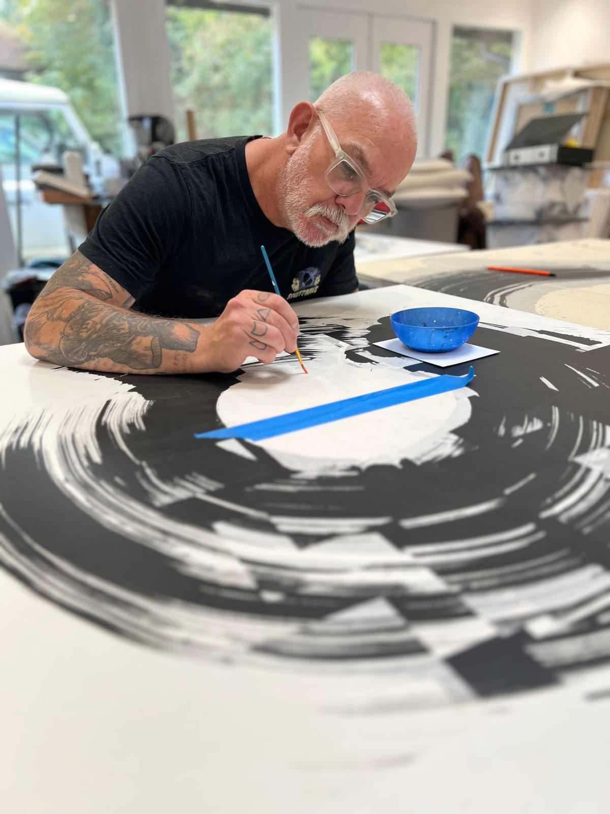 Indian Ink on paper by Abstract artist Rod McIntosh titled Optimism I of a gesural circle with gold leaf paint in the centre. Turner Art Perspective Essex Gallery
