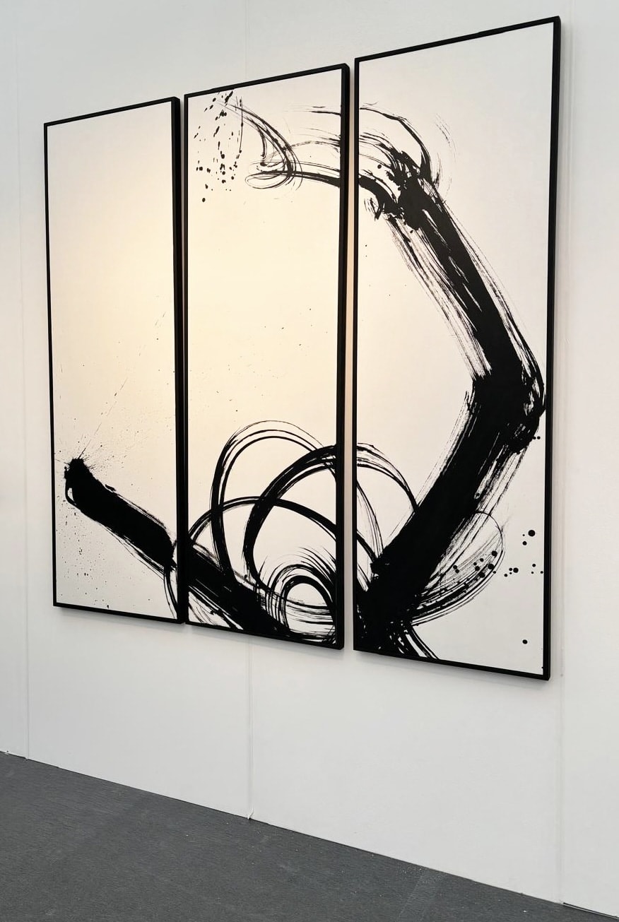 Indian Ink on paper by Abstract artist Rod McIntosh titled We Ain’t in Kansas, depicting gestural brush strokes in a swirl pattern on framed triptych. Turner Art Perspective Essex Gallery