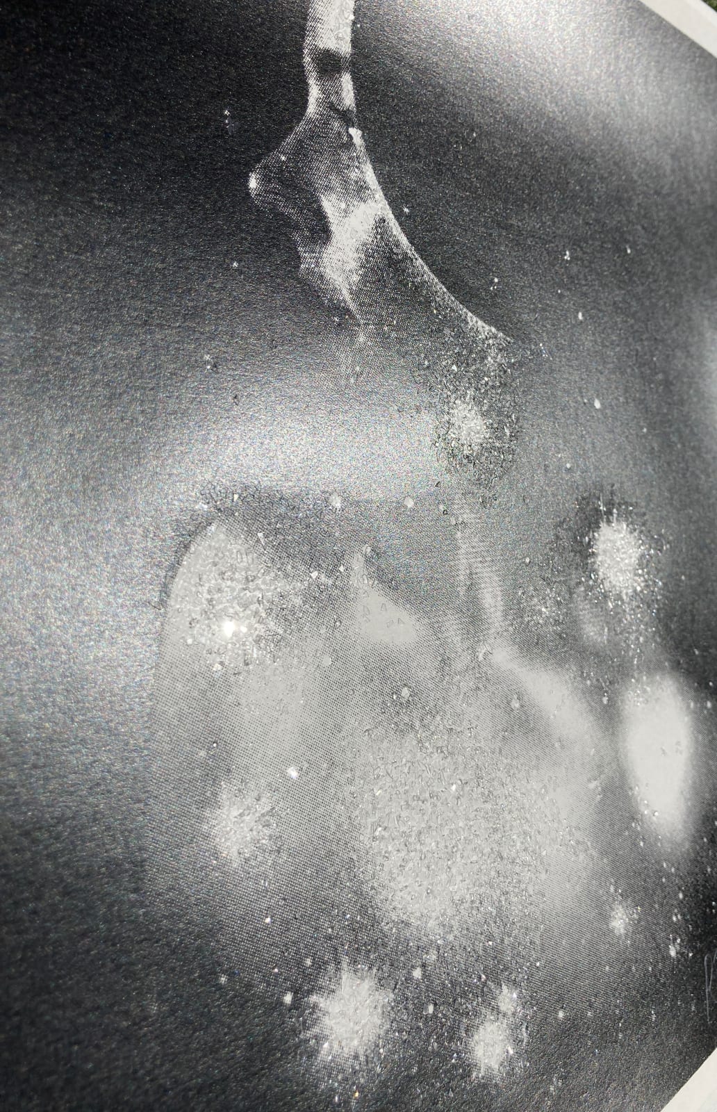 Rosie Emerson British artist creating black and white print of singer using diamond dust