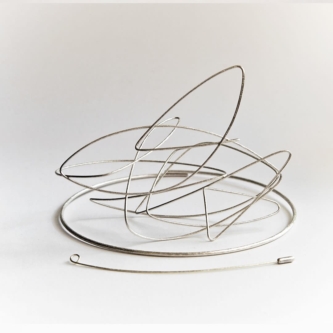 Conceptual brooch and pendant – geometric poetry - in recycled silver by conceptual jewellery artist Ute Decker