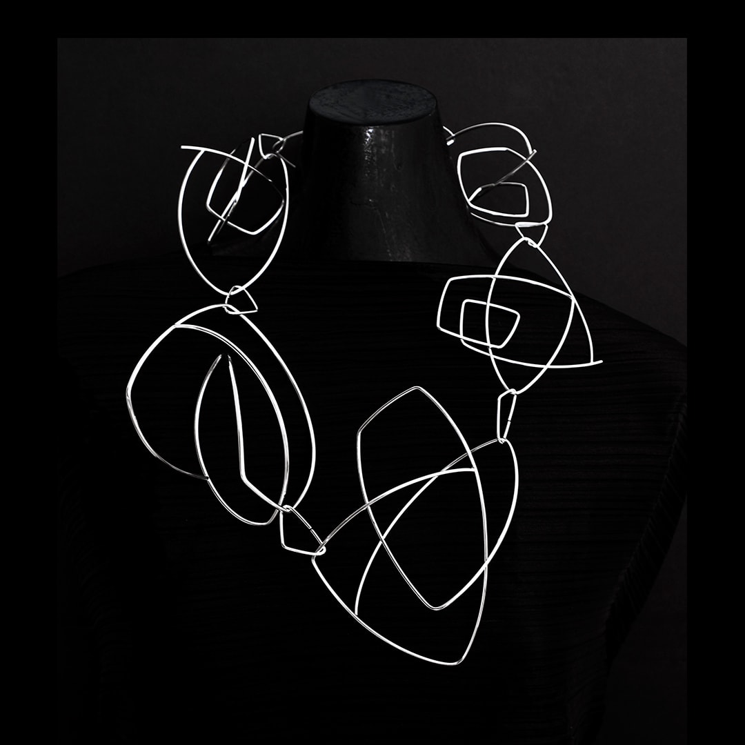 Geometric necklace – geometric poetry - in 100% recycled silver by geometric jewellery artist Ute Decker