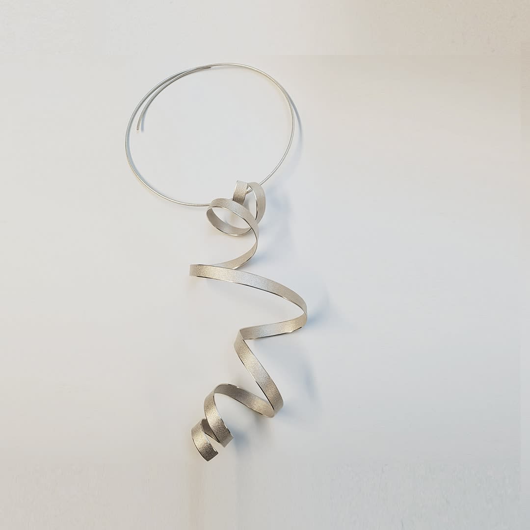 sculptural pendant – calligraphy - in recycled silver - sculptural jewellery by artist Ute Decker