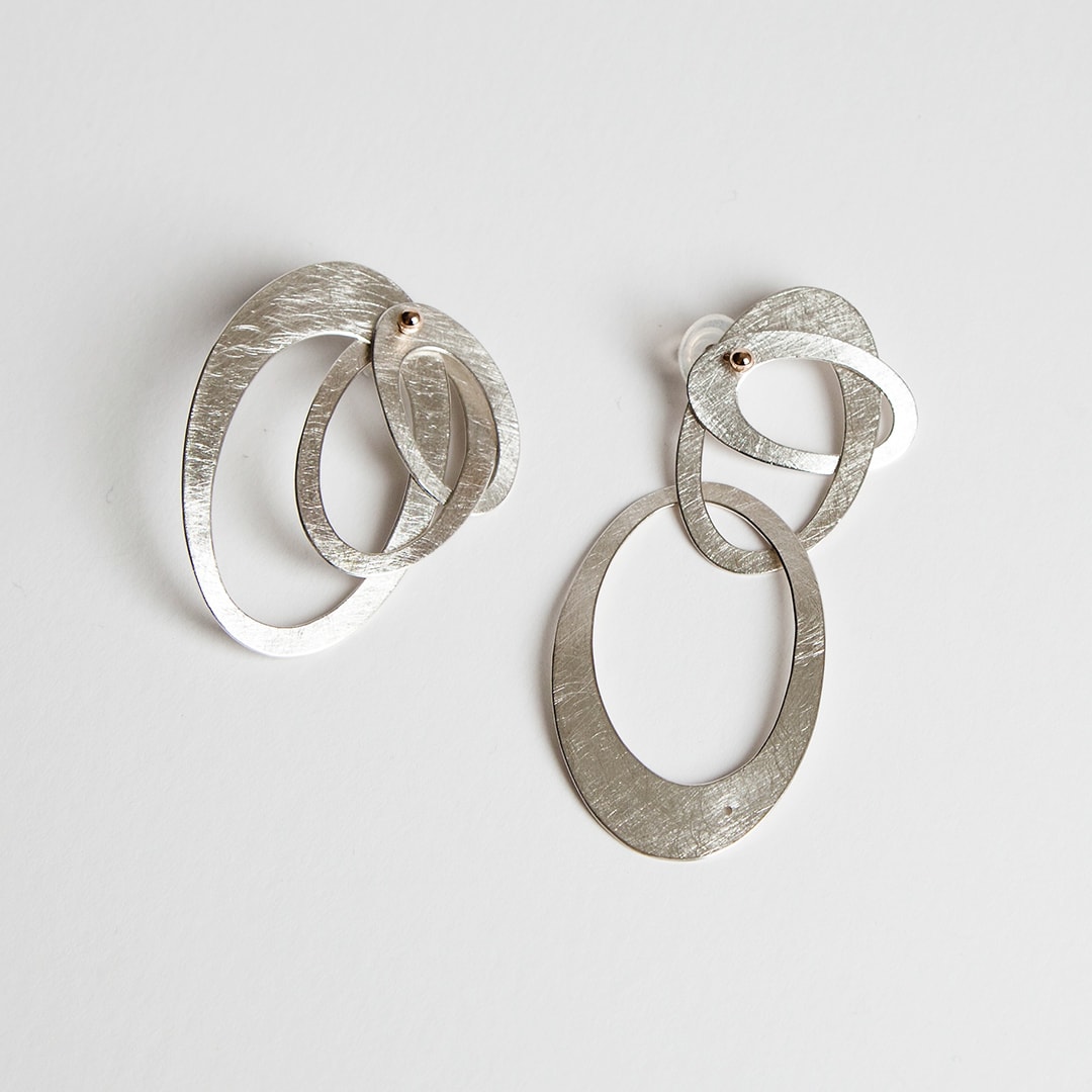 sculptural earrings by Ute Decker, jewellery artist exhibiting at Goldsmiths' Fair 2021