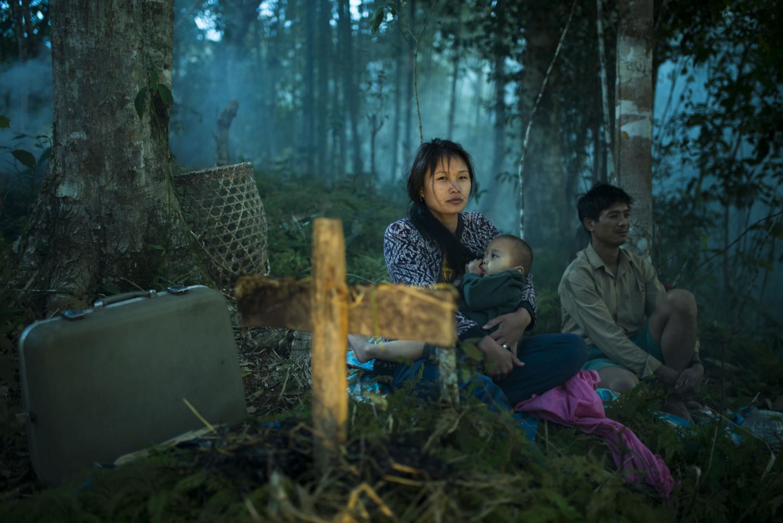 Sharbendu De, Lisangi and Dulusu Yobin wait indefinitely in the forests of Namdapha with their son, 2013