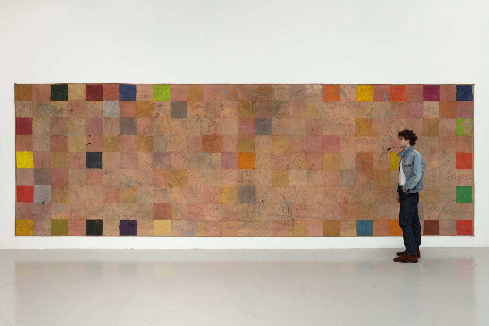large scale abstract painting with a person for scale