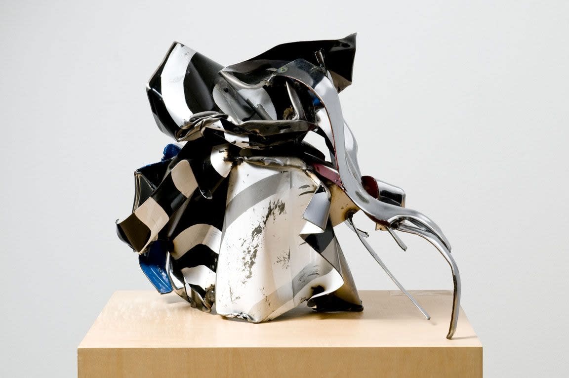 Crumpled up metal sculpture