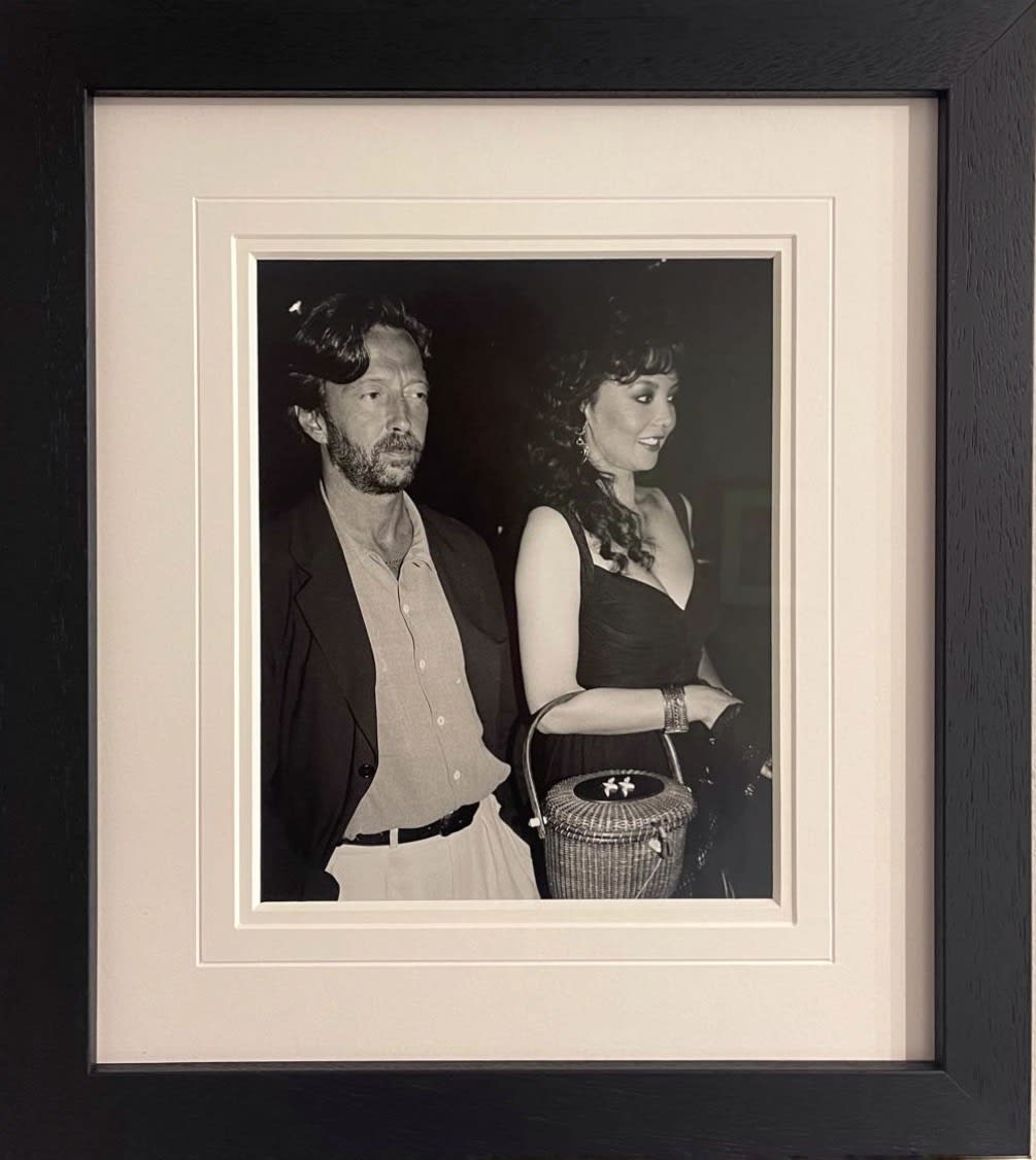 Richard Young, ERIC CLAPTON AND MARIE HELVIN, LANGAN'S BRASSERIE, 1980