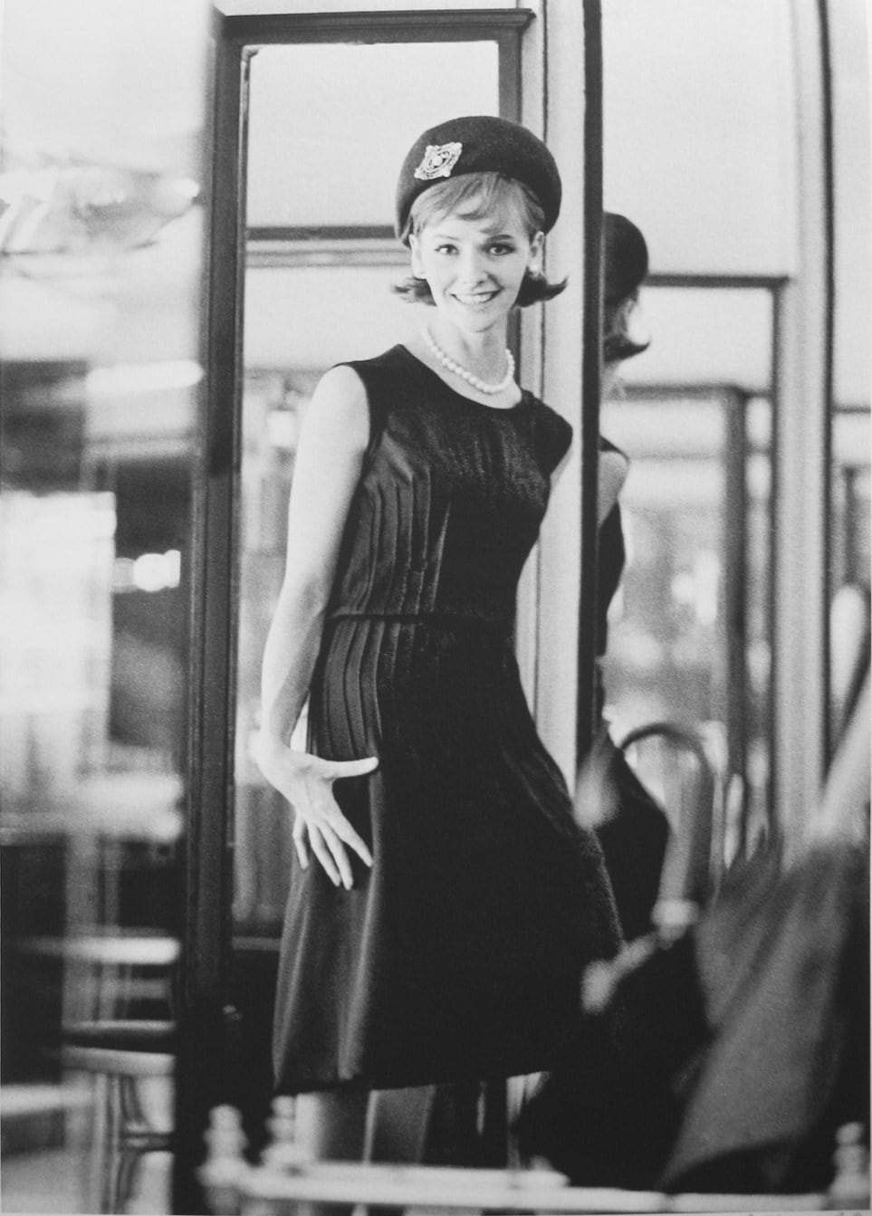 Black and white photograph of a model wearing a Chanel outfit, House of Chanel, Paris