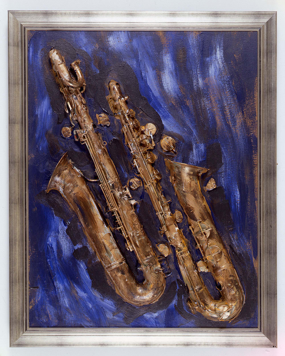 Framed tridimensional blue acrylic painting with a sliced saxophone mounted onto the canvas