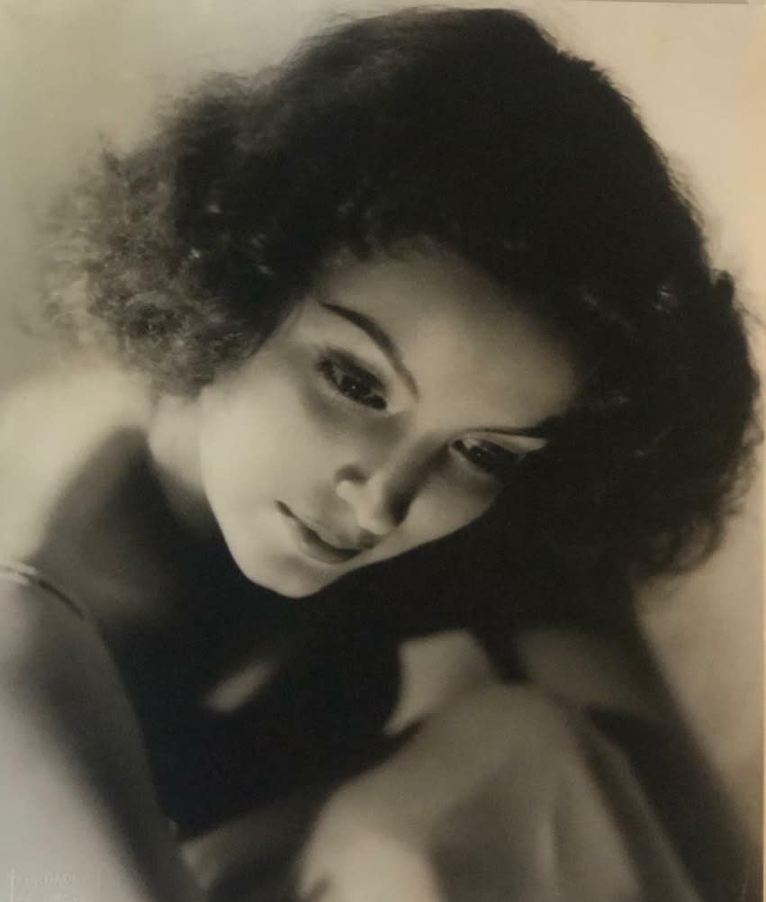 Sepia-colored black and white photograph of actress Maria Felix taken from slightly above