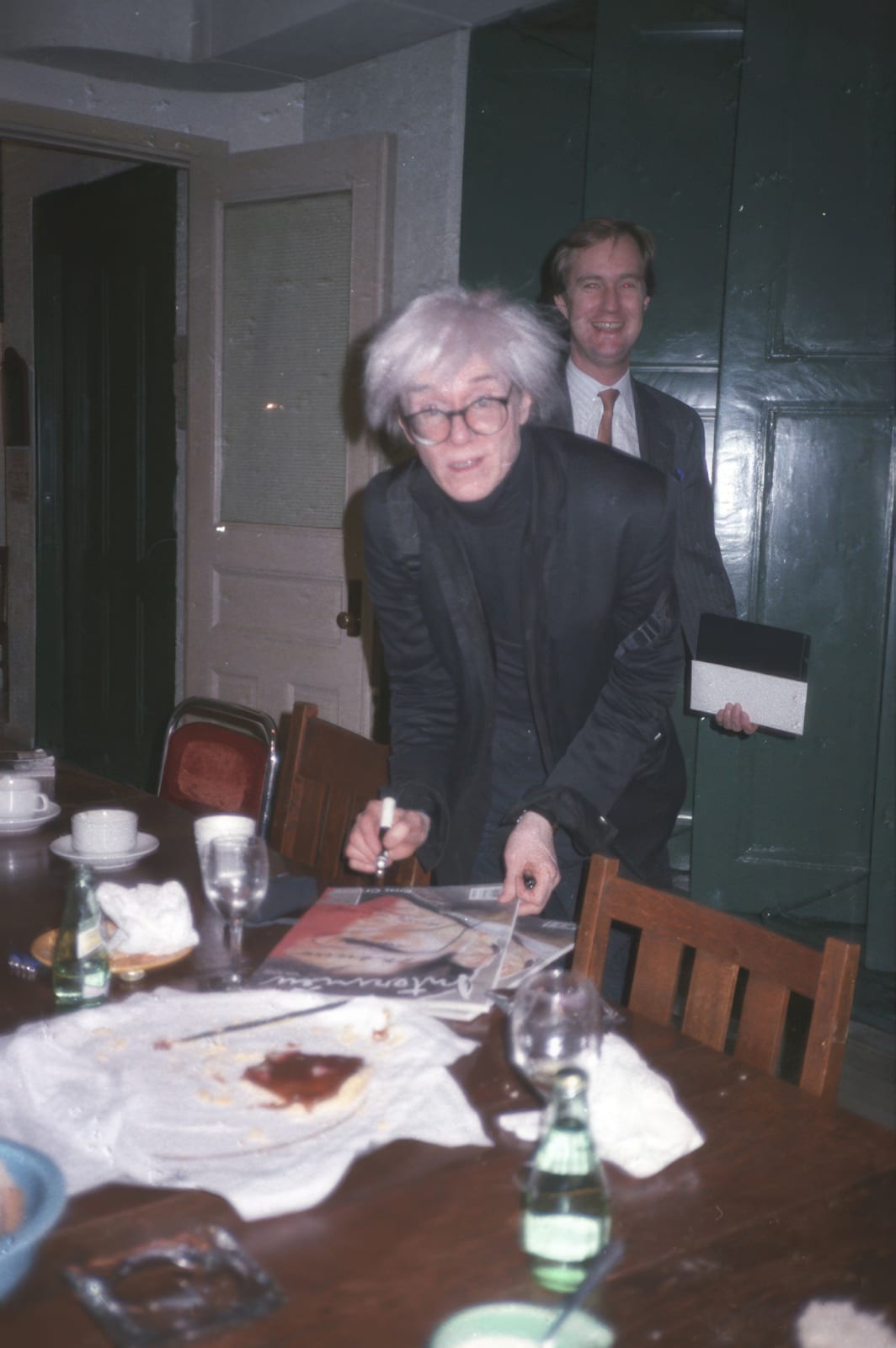 Marianne Sayn-Wittgenstein-Sayn, Andy Warhol Signing Interview Magazine, New York, NY, 1986
