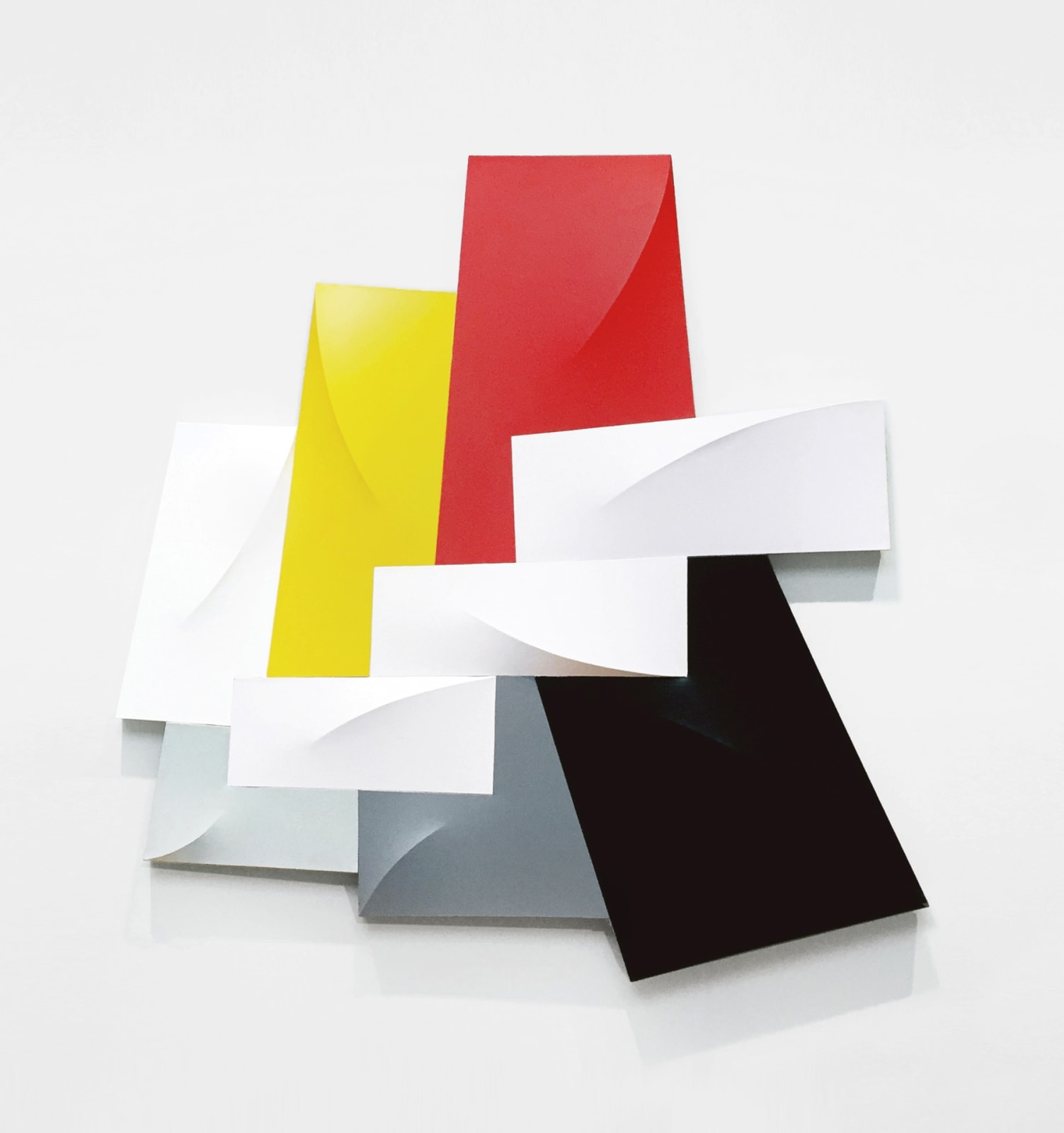 Three dimensional painting comprising nine connected canvas panels with curved supports, painted in red, yellow, black, white, and gray
