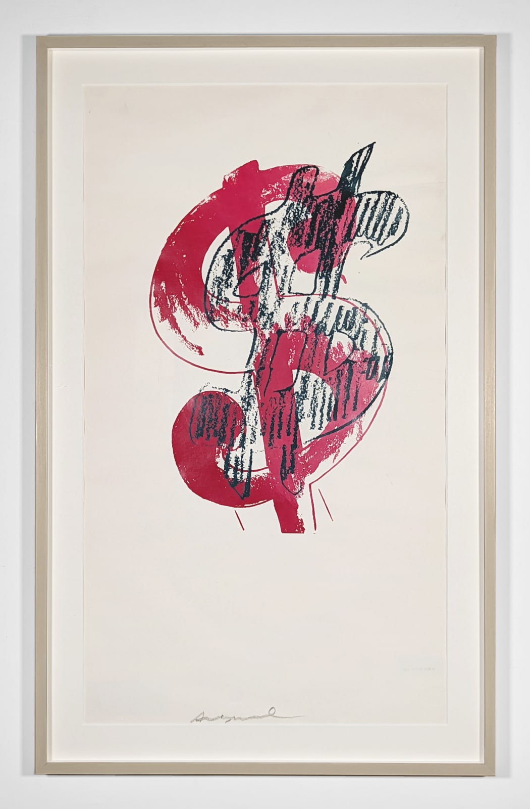 Framed print of a magenta dollar sign overlaid with a sketchy black dollar sign skewed at an angle
