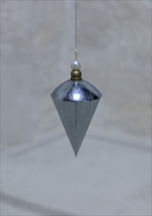Bruna Esposito, Plumb-line with a white Pearl, 2003