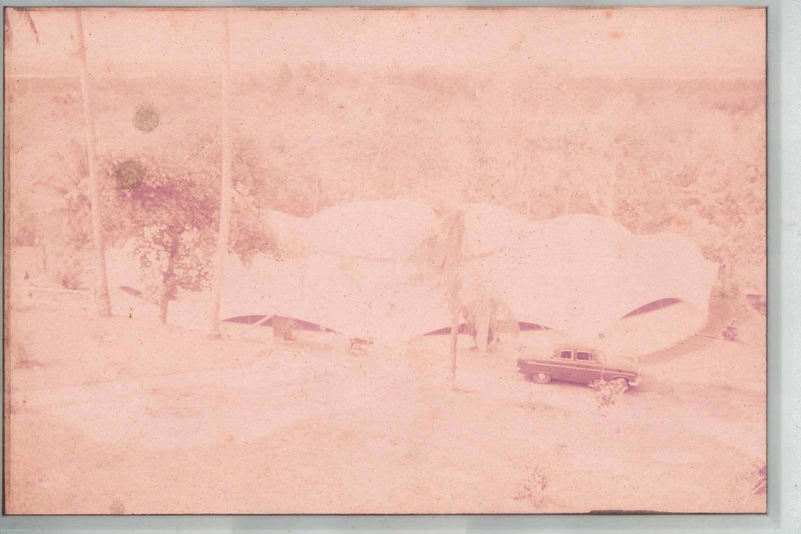 Wei Leng Tay, Untitled (car parked by building), 2022