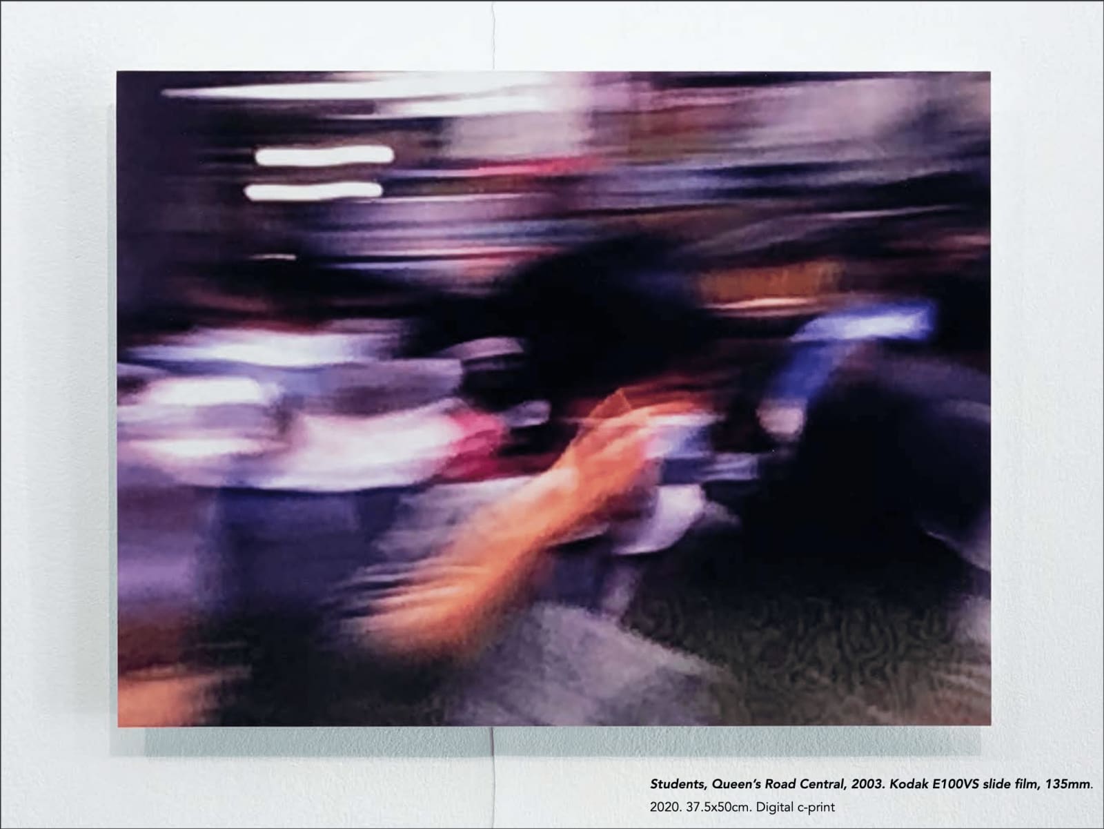 Wei Leng Tay, Students, Queen's Road Central, 2003. Kodak E100VS slide film, 135mm., 2020