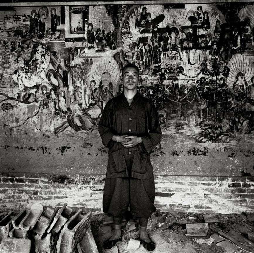 Liu Zheng, A Young Monk in Front of Ancient Mural, Lingqiu, Shanxi Province, From the series The Chinese, 1996
