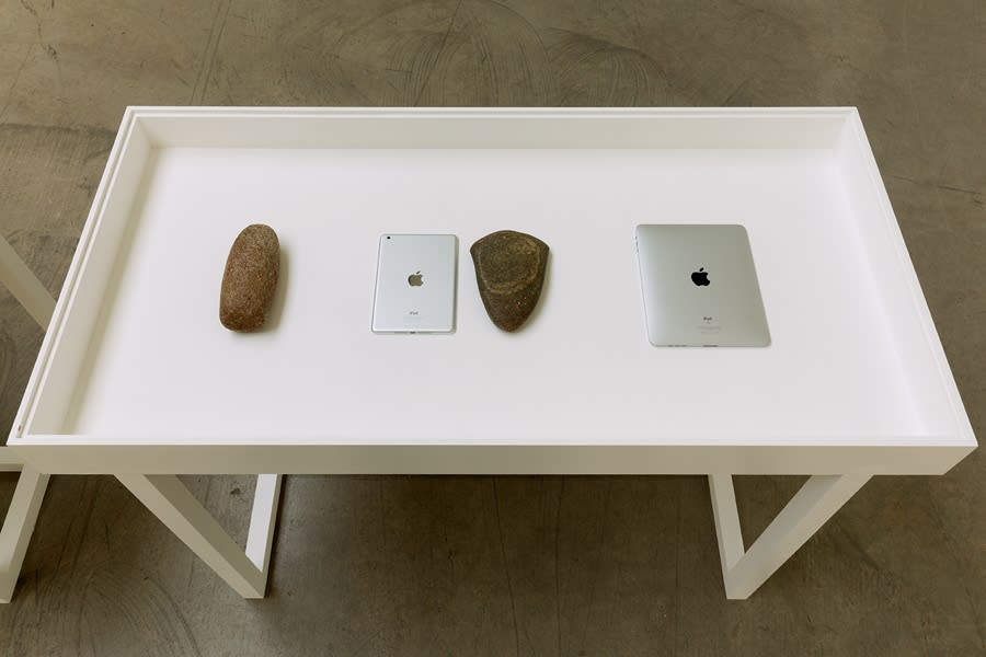 Exchange a mobile phone for a stone tool