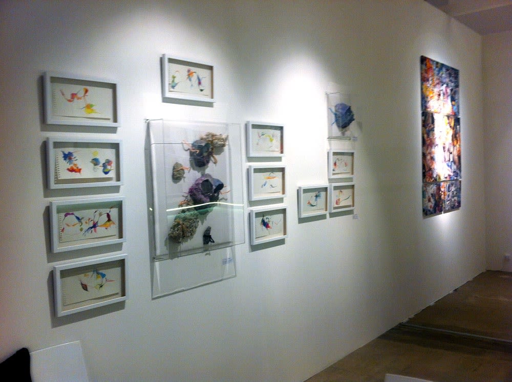 Marya Dmitrieva, Vlad Kulkov works at the gallery's stand.
