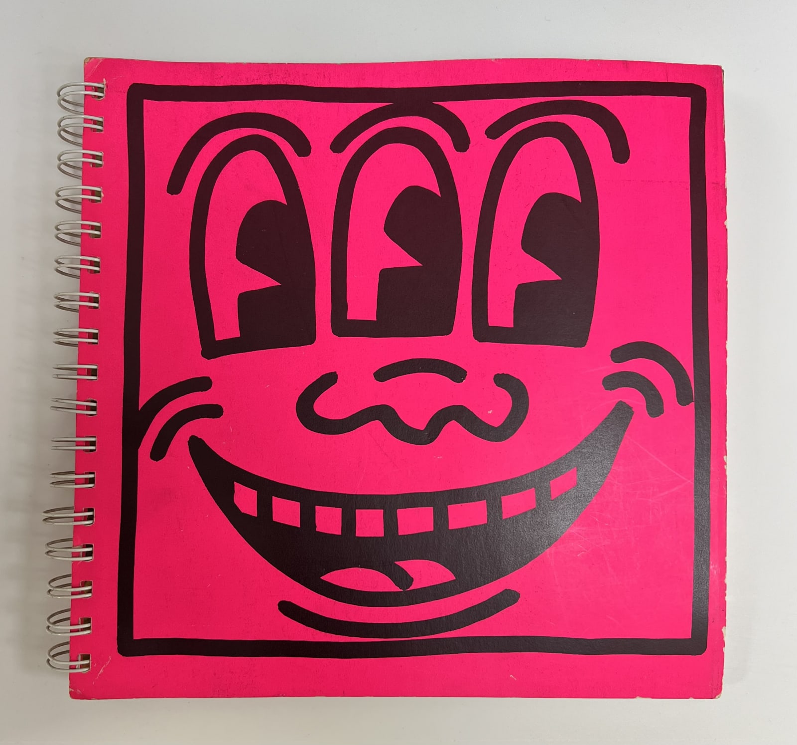 Keith Haring, Untitled (‘Art Attack on Aids’ - Unique drawing on Tony Shafrazi catalogue), 1985