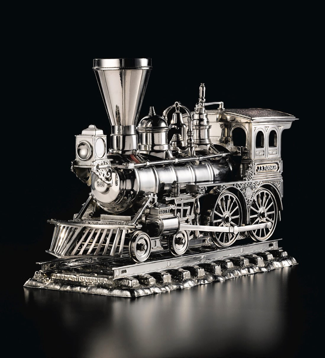 Jeff Koons Jim Beam - J.B. Turner Engine 1986 stainless steel, bourbon 11 x 17 1/8 x 6 1/2 inches 27.9 x 43.2 x 16.5 cm Edition 1 of 3, with 1 AP