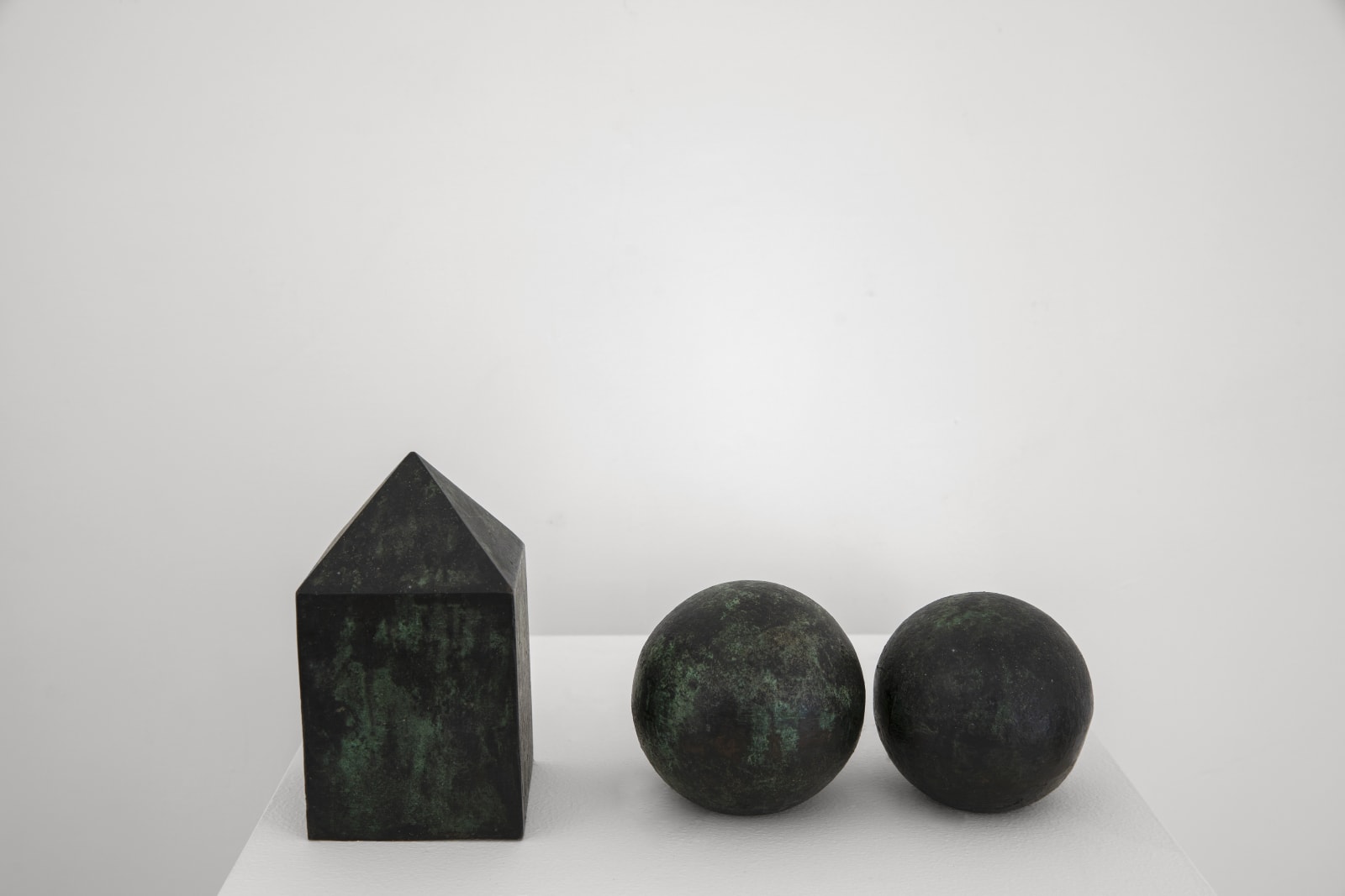 Two Balls With Obelisk, 1963-85 bronze 10.5 x 25 x 8.5 cm. 4 13/100 x 9 42/50 x 3 7/20 in.