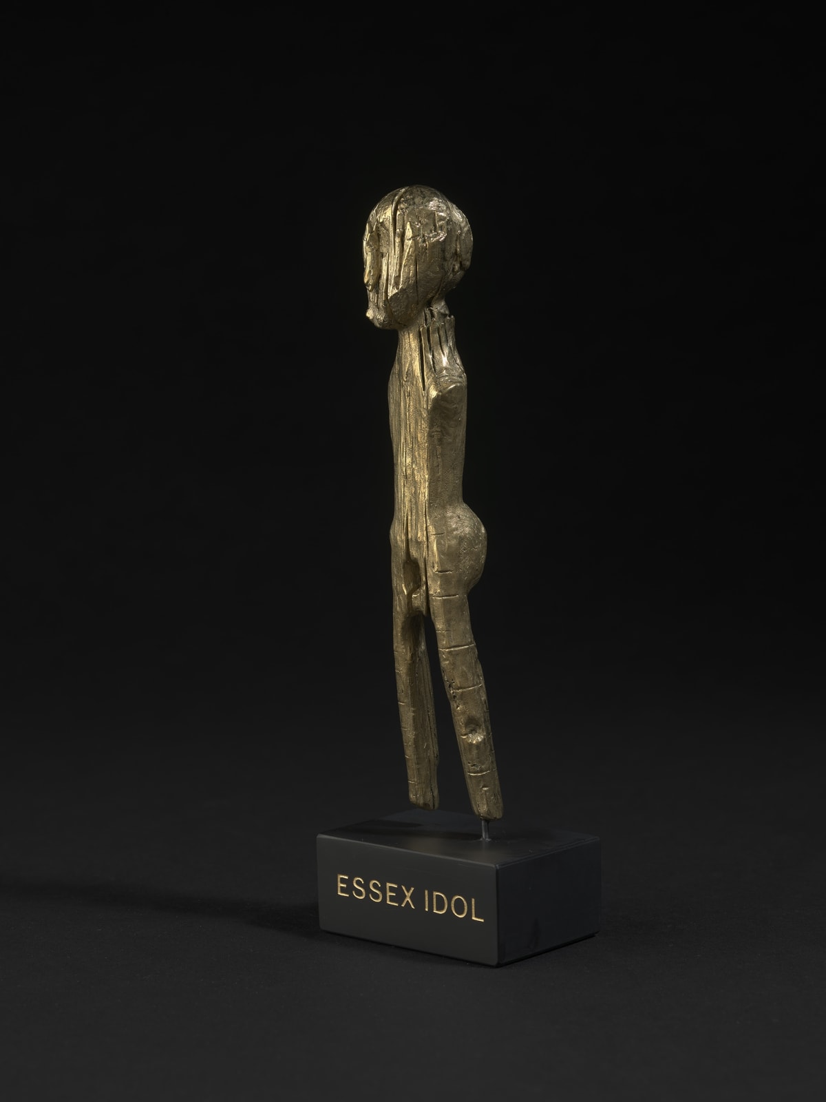 Mantelpiece Idol, 2021, polished brass, slate, 23ct gold, 22 x 7 x 5 cm