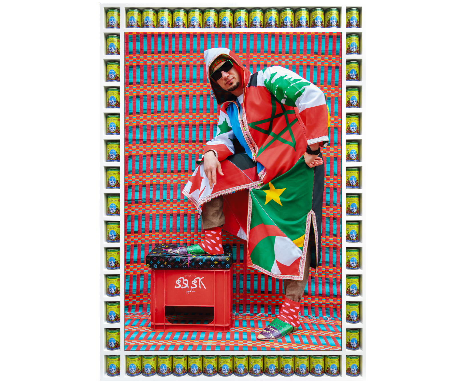 Hassan Hajjaj (Moroccan, b. 1961) Omar Offendum, 2013/1434 Metallic Lambda on 3mm Dibond in a Poplar Sprayed-White Frame with Small Lighthouse Harissa Cans Image: 44" x 30" (112 x 76 cm) Framed: Approximately 52 5/8” x 37 1/8” x 2 1/2" (133.5 x 94.5 x 6.5 cm) Edition of 5 plus 2 artist's proofs