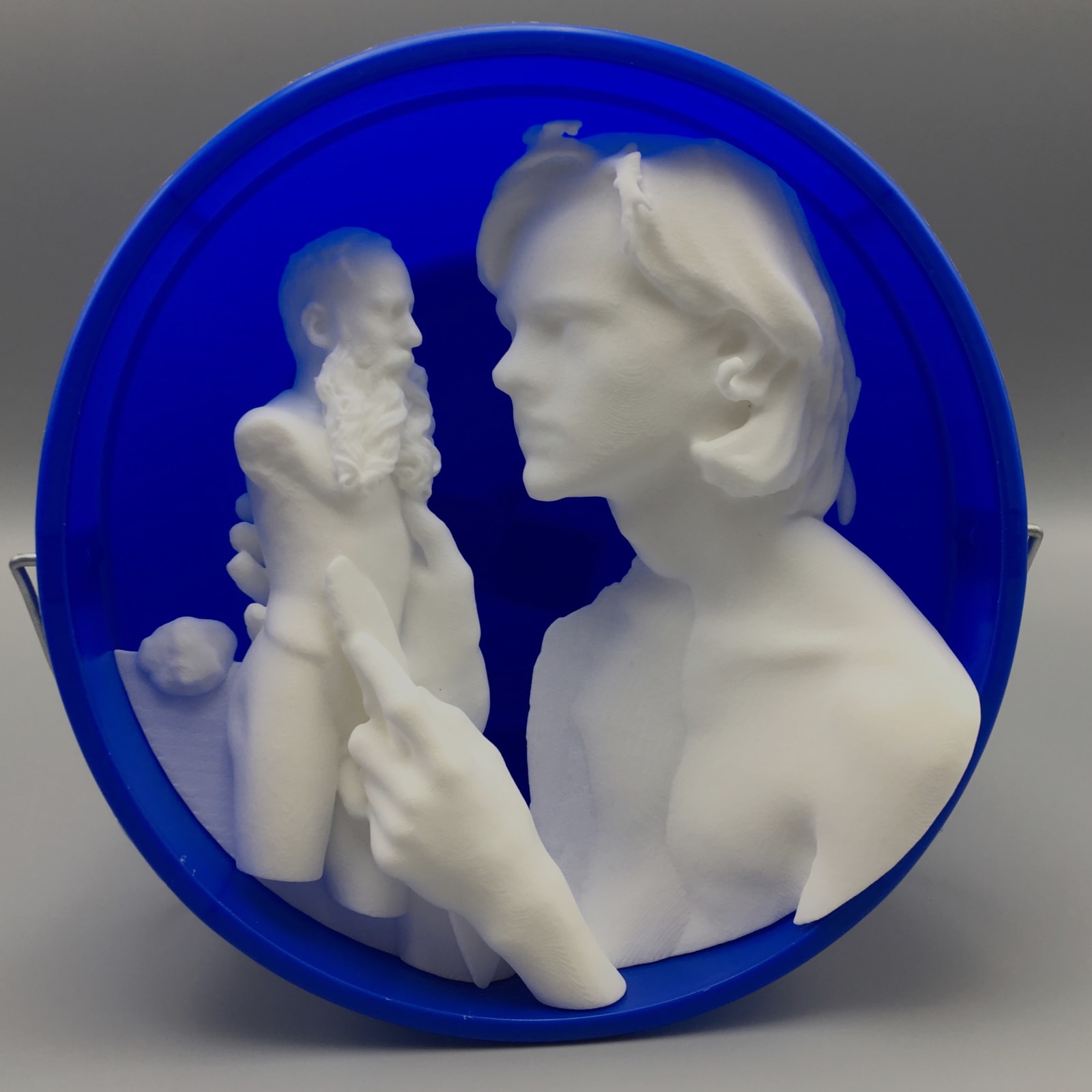 Two three-dimensional figures in white
