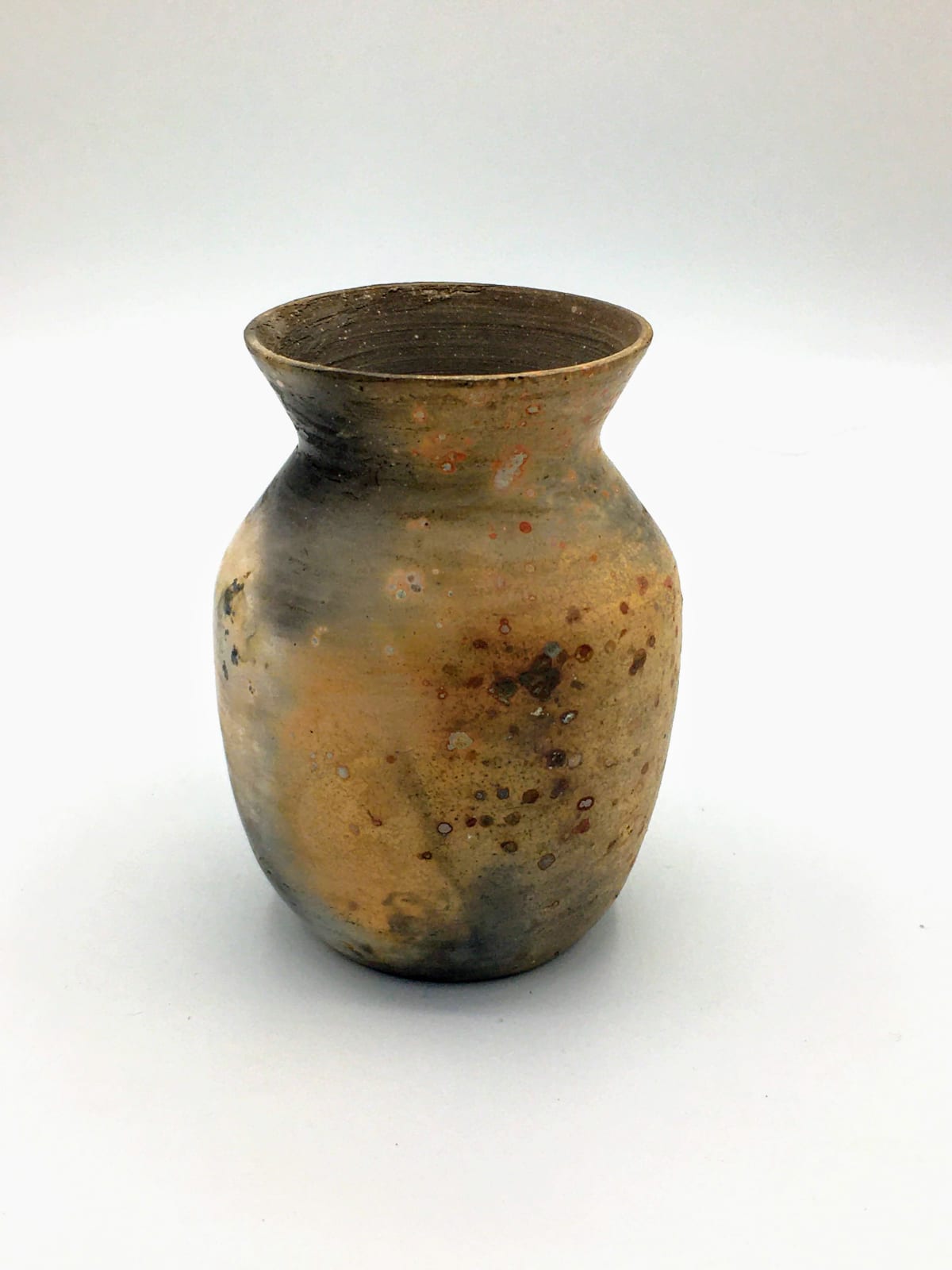 A small ceramic bottle