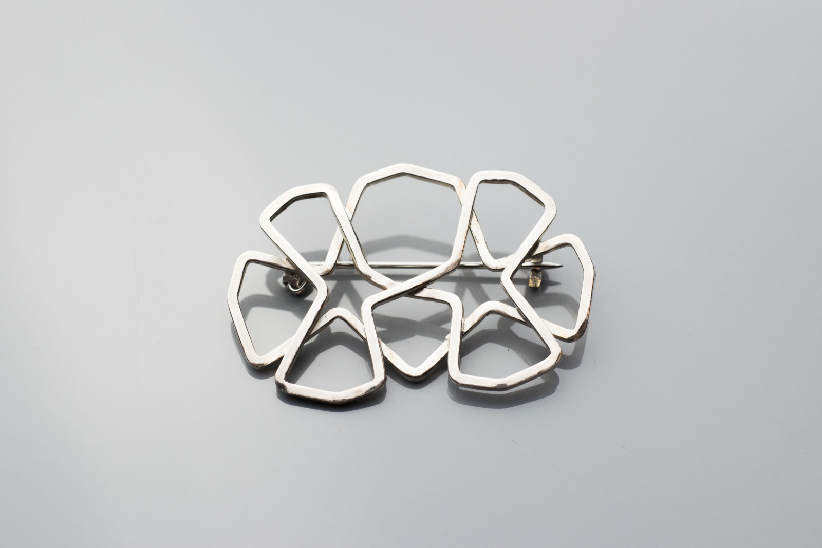 A silver brooch
