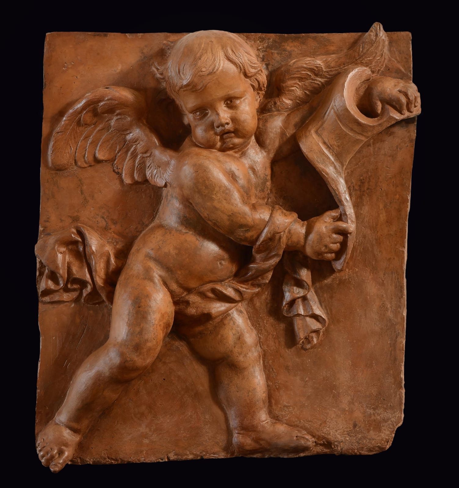Hieronymus Duquesnoy the Younger (Brussels 1602 - 1654 Ghent) (attributed), A Putto holding part of a Cartouche