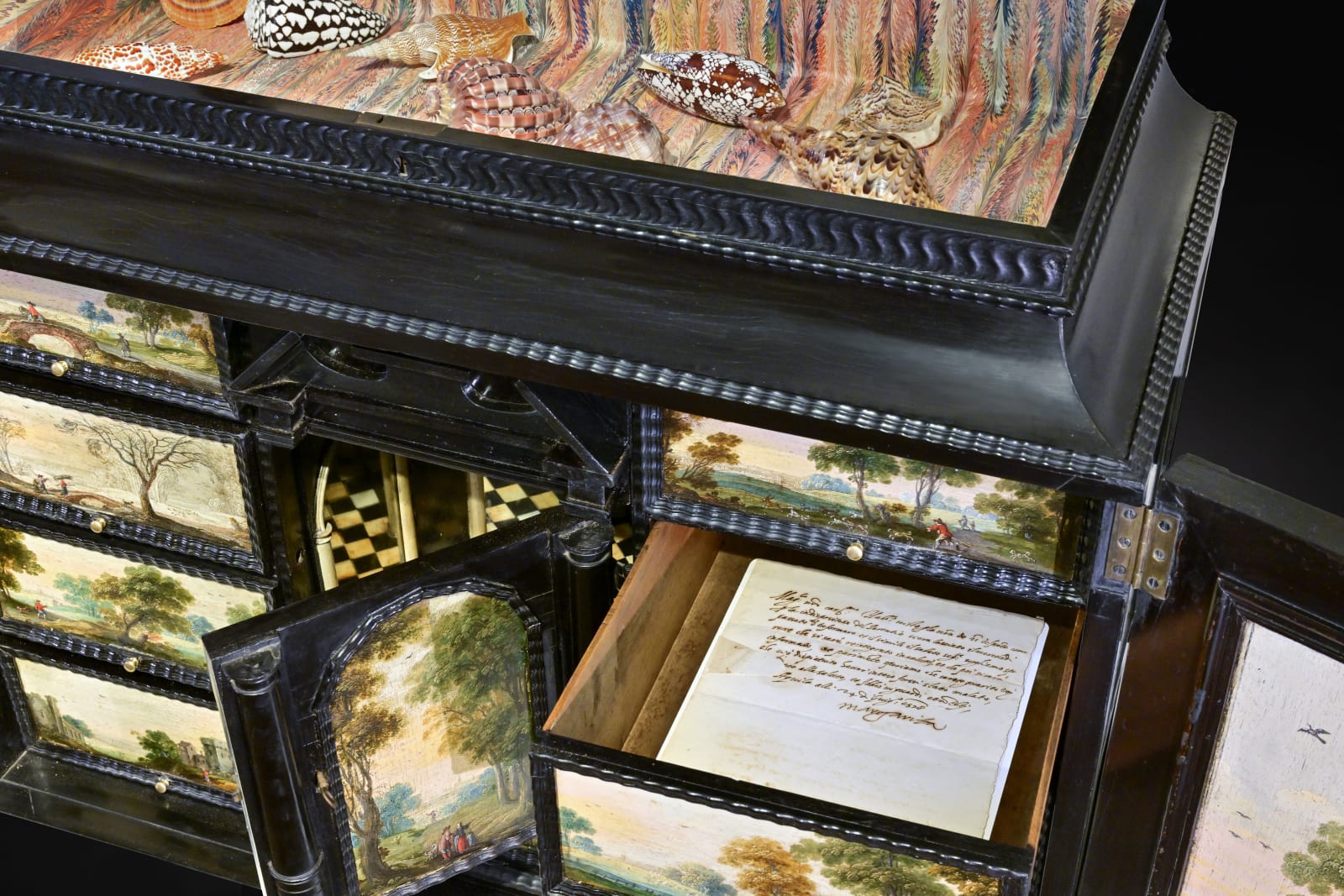 An Antwerp Ebony veneered Painted Cabinet, ca. 1660, with landscape paintings by Isaac van Oosten and workshop (Antwerp 1613 - 1661)