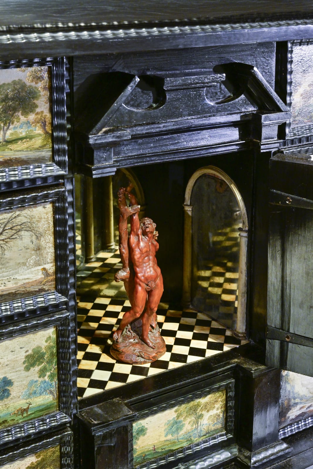 An Antwerp Ebony veneered Painted Cabinet, ca. 1660, with landscape paintings by Isaac van Oosten and workshop (Antwerp 1613 - 1661)