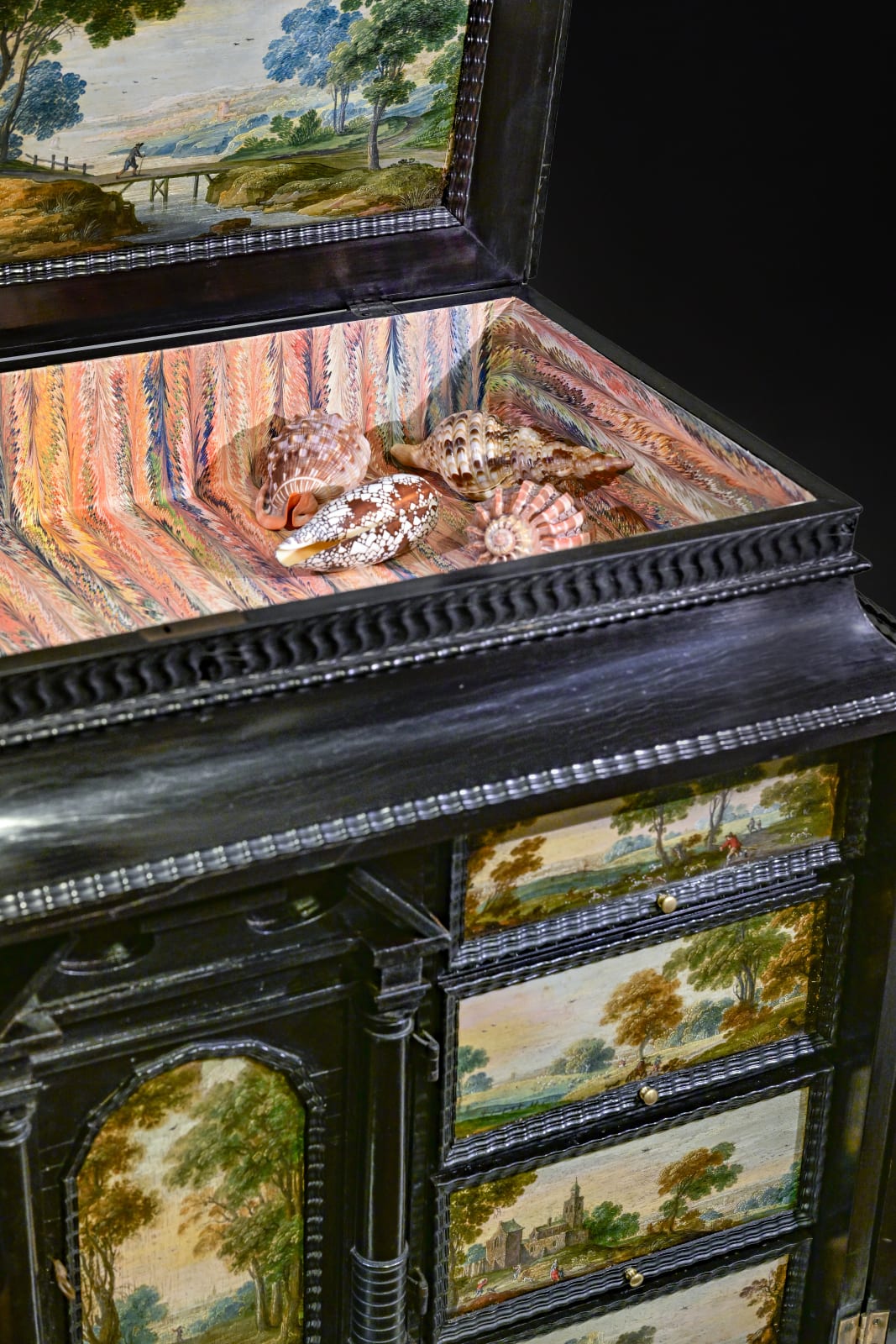 An Antwerp Ebony veneered Painted Cabinet, ca. 1660, with landscape paintings by Isaac van Oosten and workshop (Antwerp 1613 - 1661)