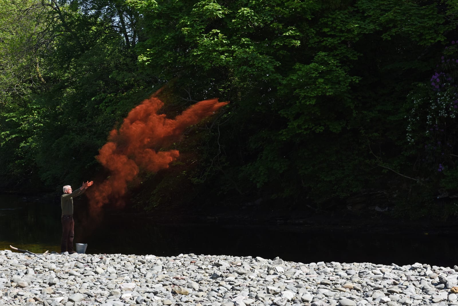 Andy Goldsworthy, Red river stone. Crushed into dust. Thrown. Dumfriesshire, Scotland. 30 May 2016, 2016