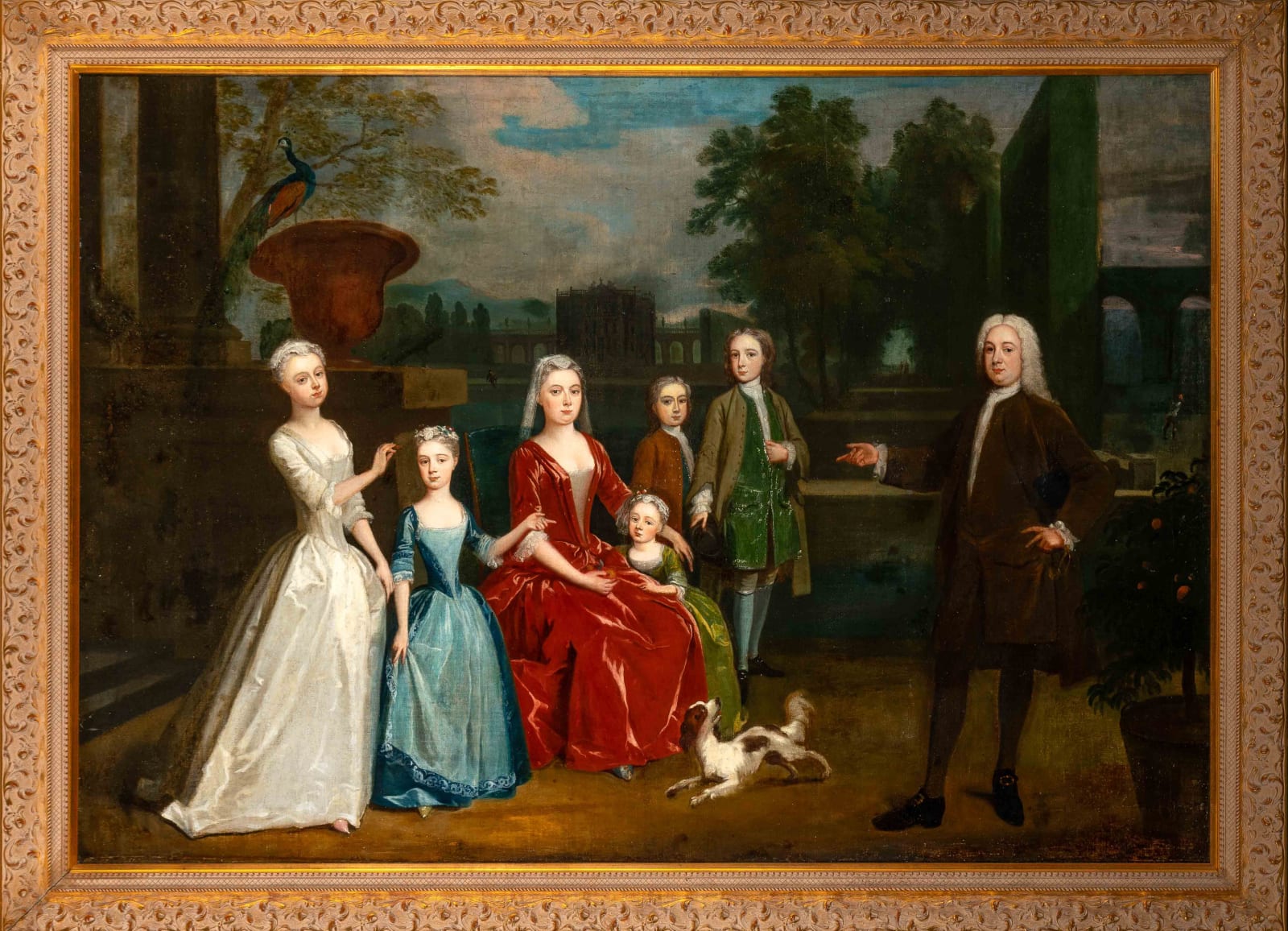 Attributed to Charles Philips (1703-1747), The Dalbiac family standing in the garden of a country estate, circa 1730