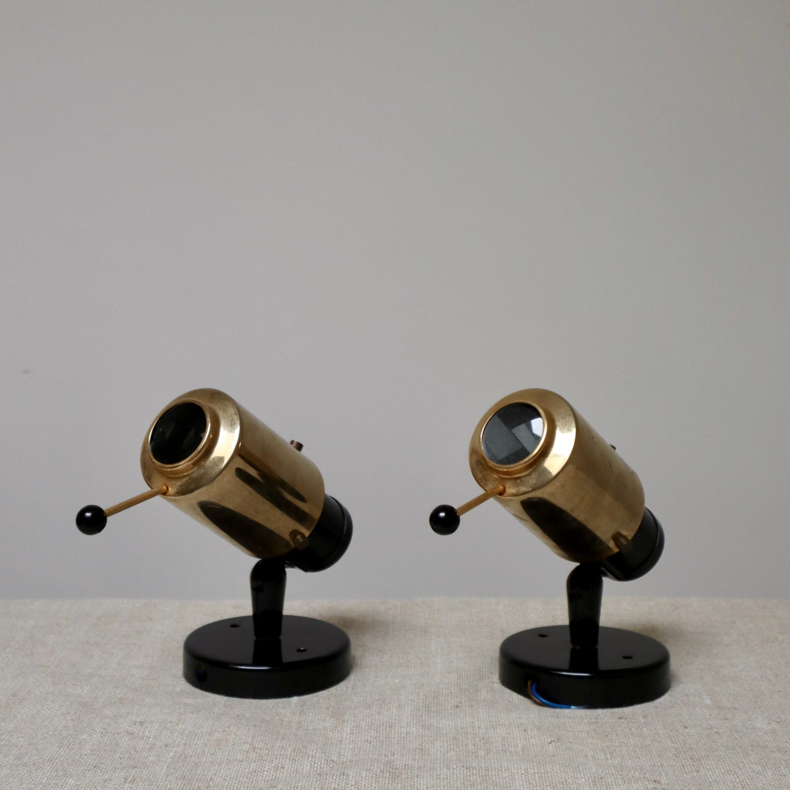 Jacques Biny, A Pair of Zodiac Wall Lights, Circa 1950s