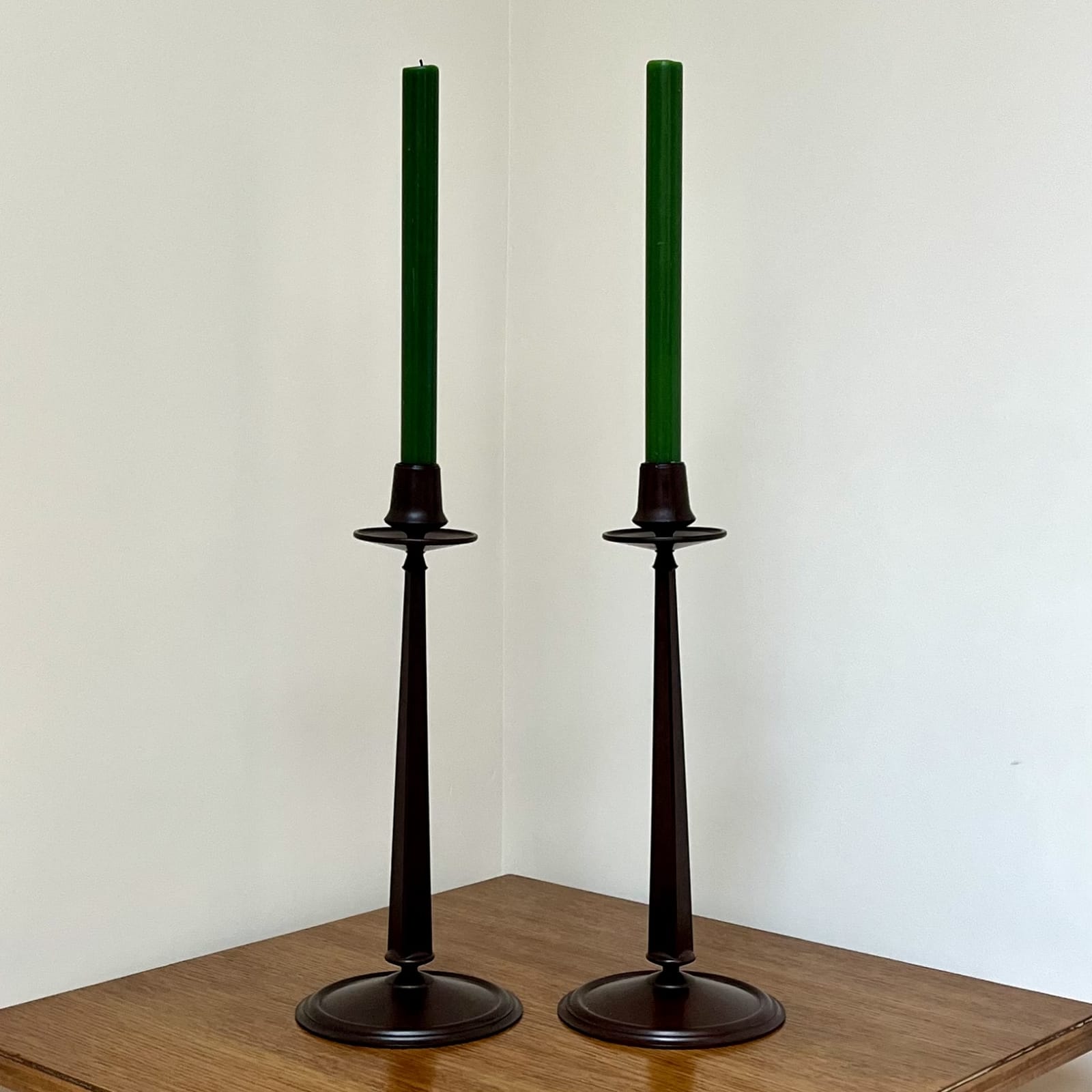 Charles Rennie Mackinosh, A Pair of Bakelite Candle Holders, Circa 1930s