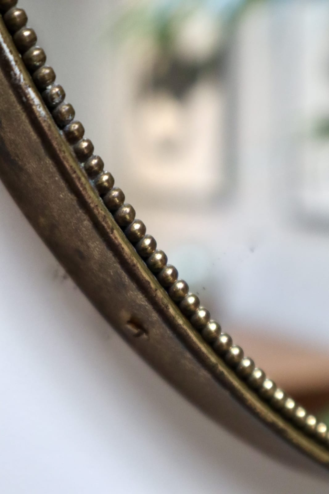 Italian, An Oval Brass Mirror, Circa 1960s