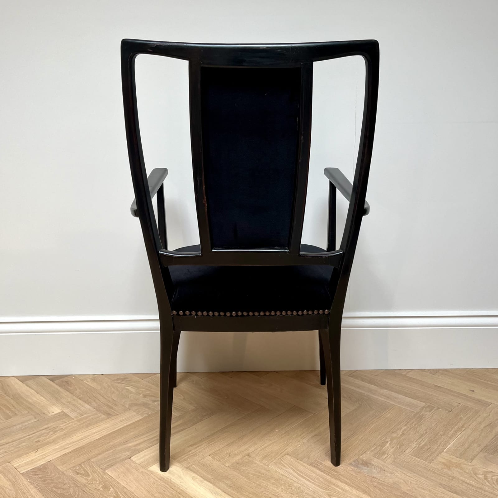 Italian, A Pair of Ebonized Armchairs, Circa 1950s