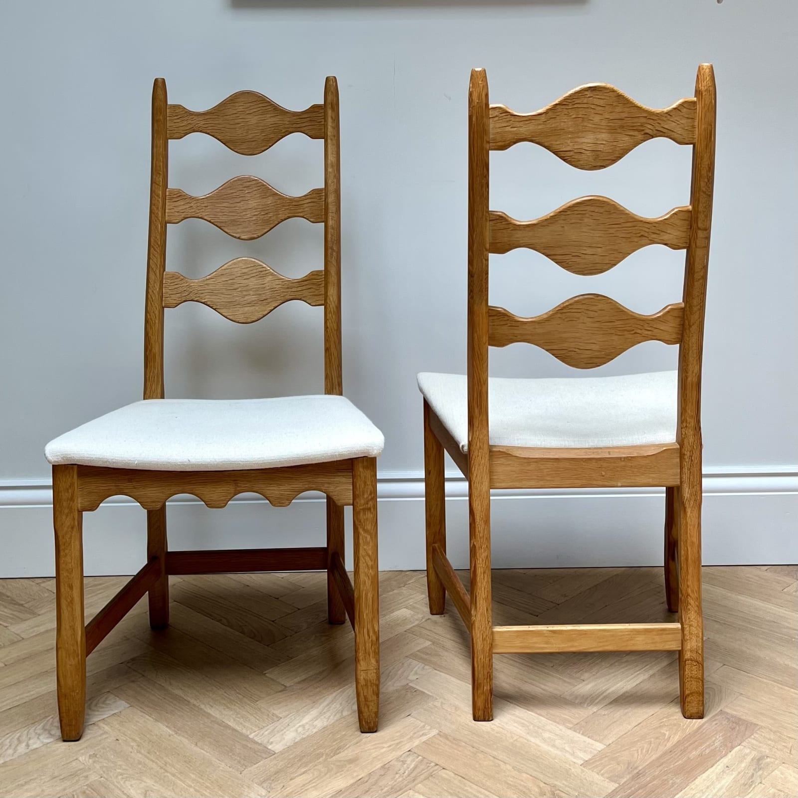 Henning Kjaernulf, A Pair of Ladder Back Chairs, Circa 1970s