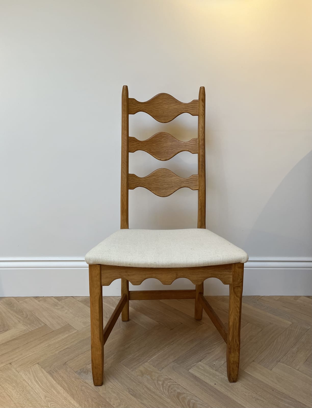 Henning Kjaernulf, A Pair of Ladder Back Chairs, Circa 1970s