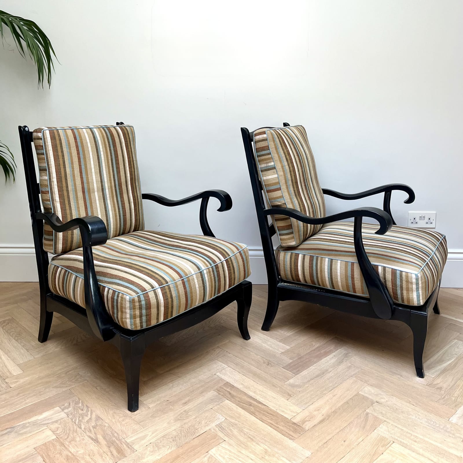Italian, A Pair of Ebonized Armchairs, Circa 1950s