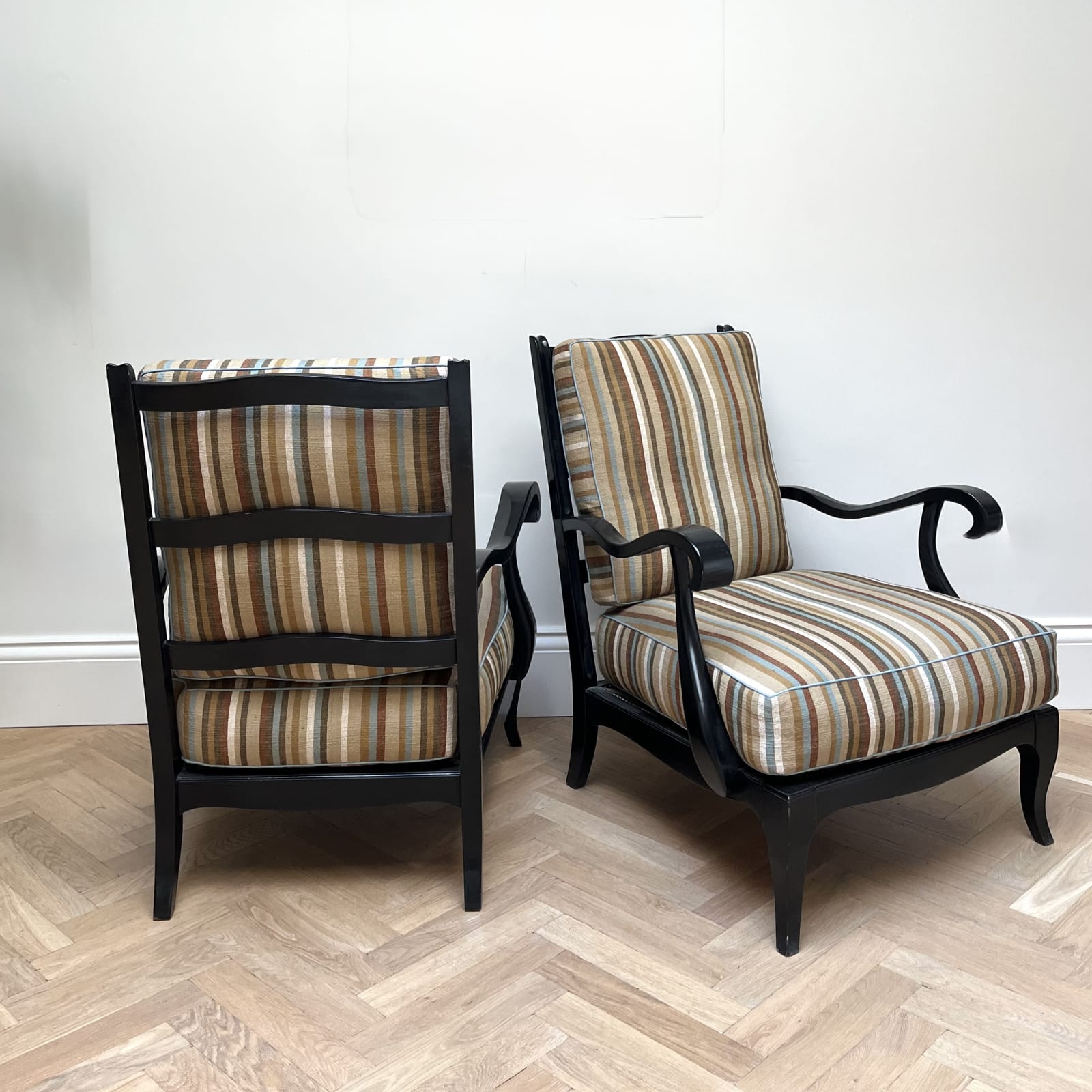 Italian, A Pair of Ebonized Armchairs, Circa 1950s