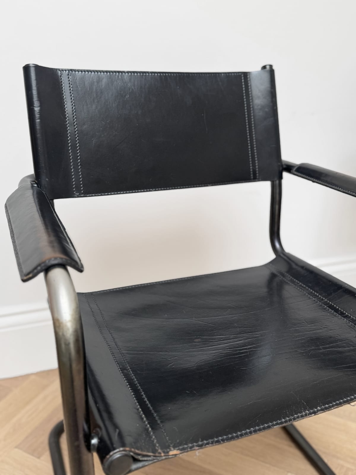 Tito Agnoli for Unifor, A Black Leather Cantilevered Desk Chair, Circa 1970s