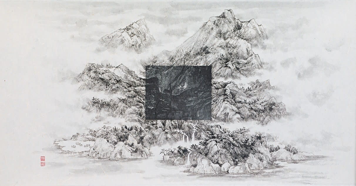 A black square photography printed in the middle of mountains